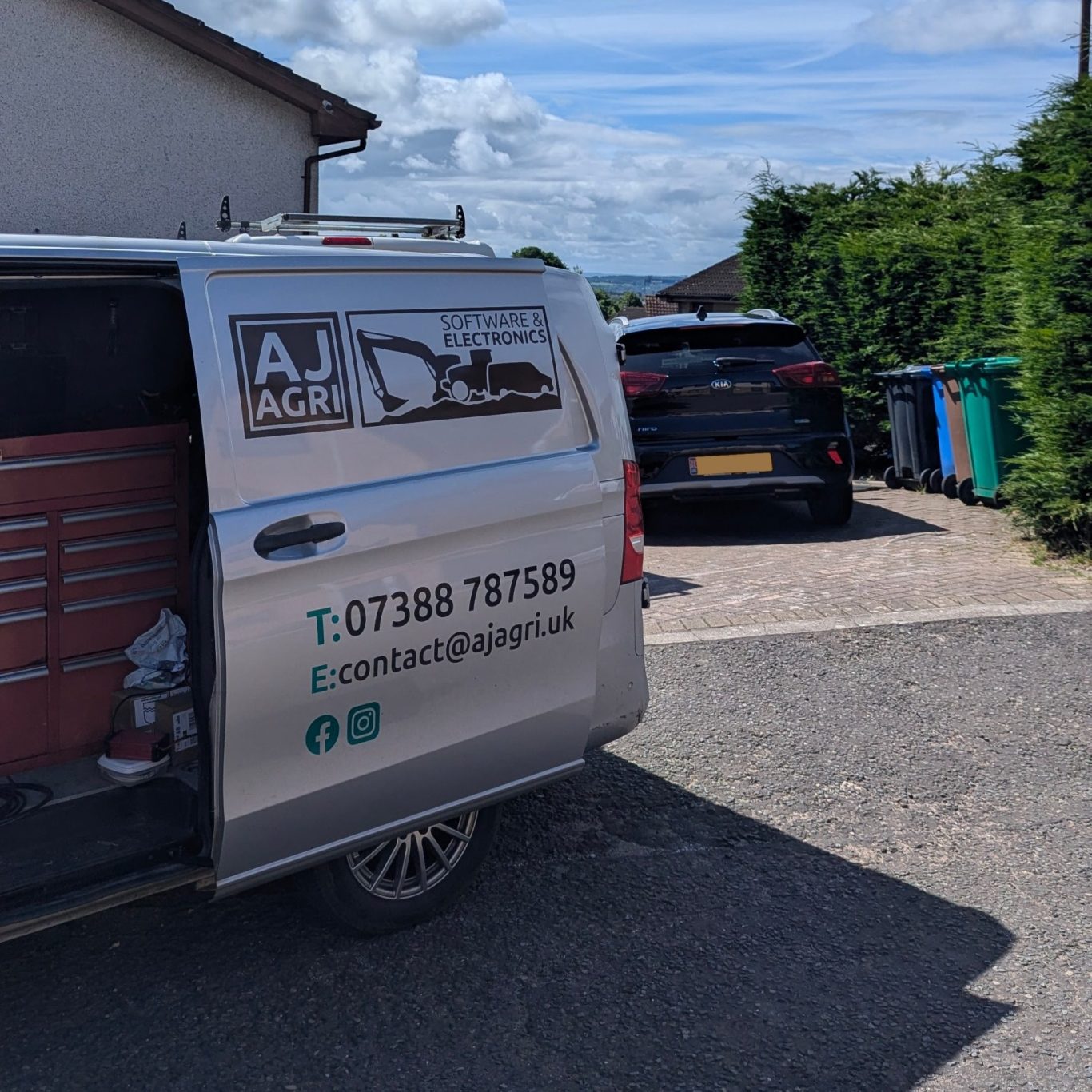 mobile-car-electrical-fault-diagnostics-fife An on-site photograph of the silver AJ AGRI Mercedes mobile diagnostic van parked on a driveway in Fife with its side door open, displaying
